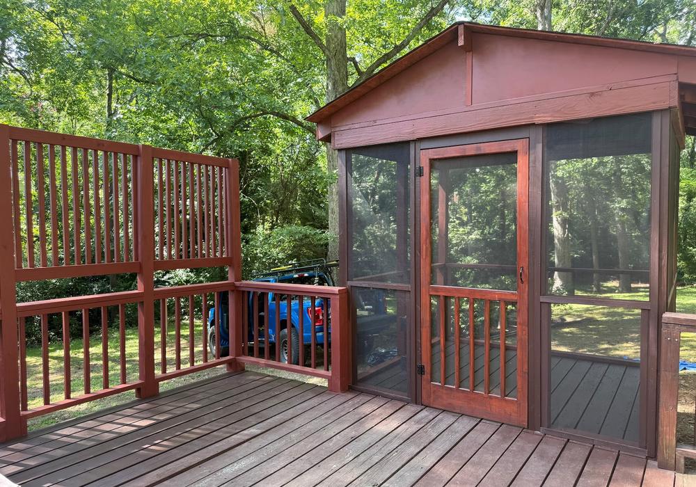 Rebuilt and stained screened porch and deck by JeDi Works