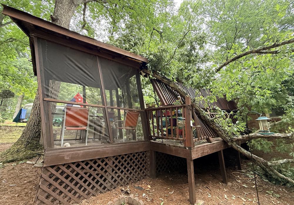Storm-damaged screened porch and deck before rebuild, Charlotte NC area