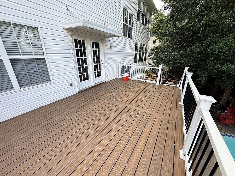 New Trex composite deck with white railing built by JeDi Works in the Charlotte NC area
